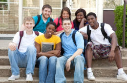 [Image of a group of high school students] Click the button below for information about education programs